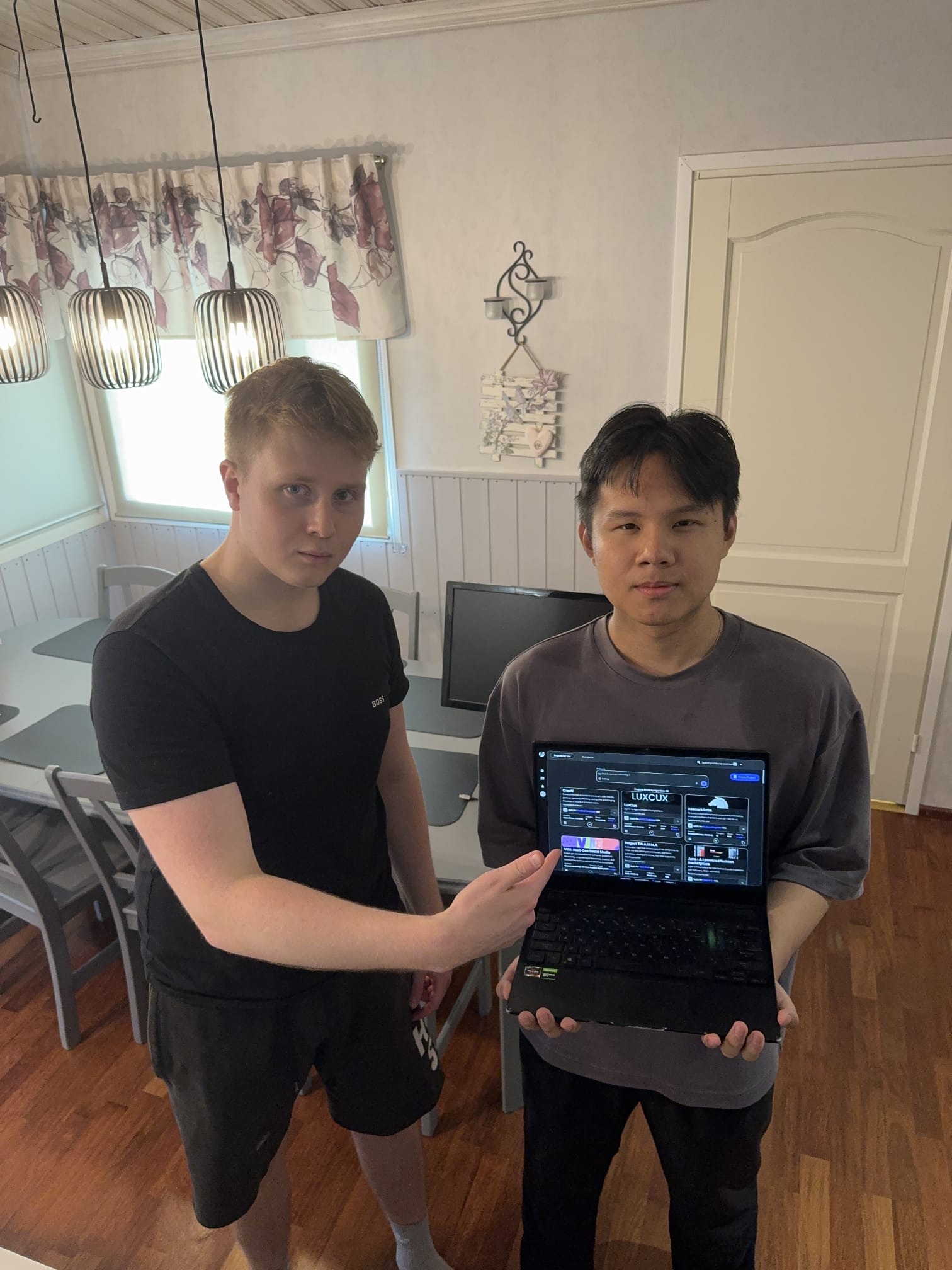 Jami Tanskanen and Daniel Matias during a build sprint in Finland — the platform on the laptop was already live and serving real users